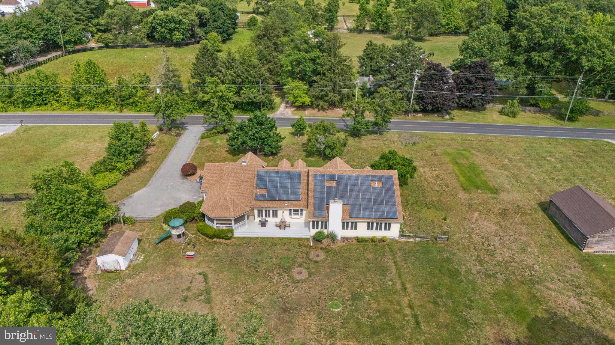 836 Hardingville Road Monroeville, NJ 08343 - Photo 52 of 58 Spacious home with solar panels, lush greenery.