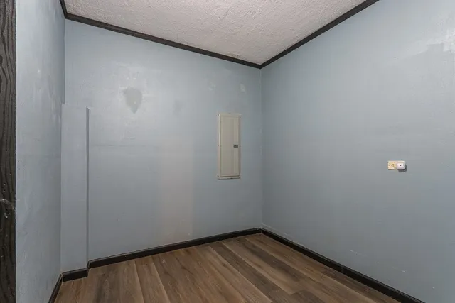 a view of small space with wooden floor