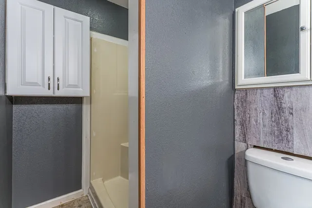 a view of roof deck with a patio