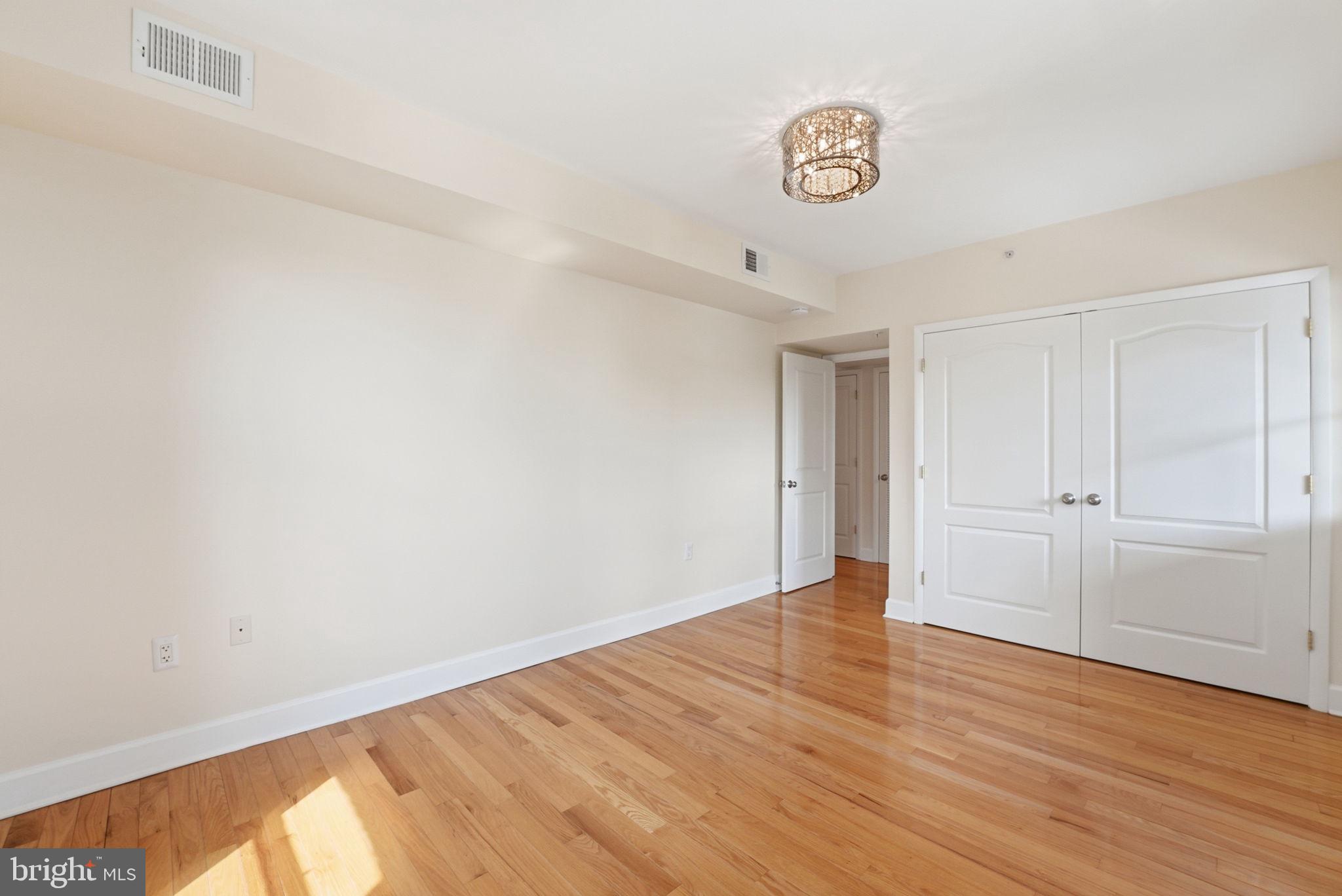 1858 California Street Northwest, Unit 33 Washington, DC 20009 - Photo 20 of 31 Sunny Bedroom, Ample Closet Space