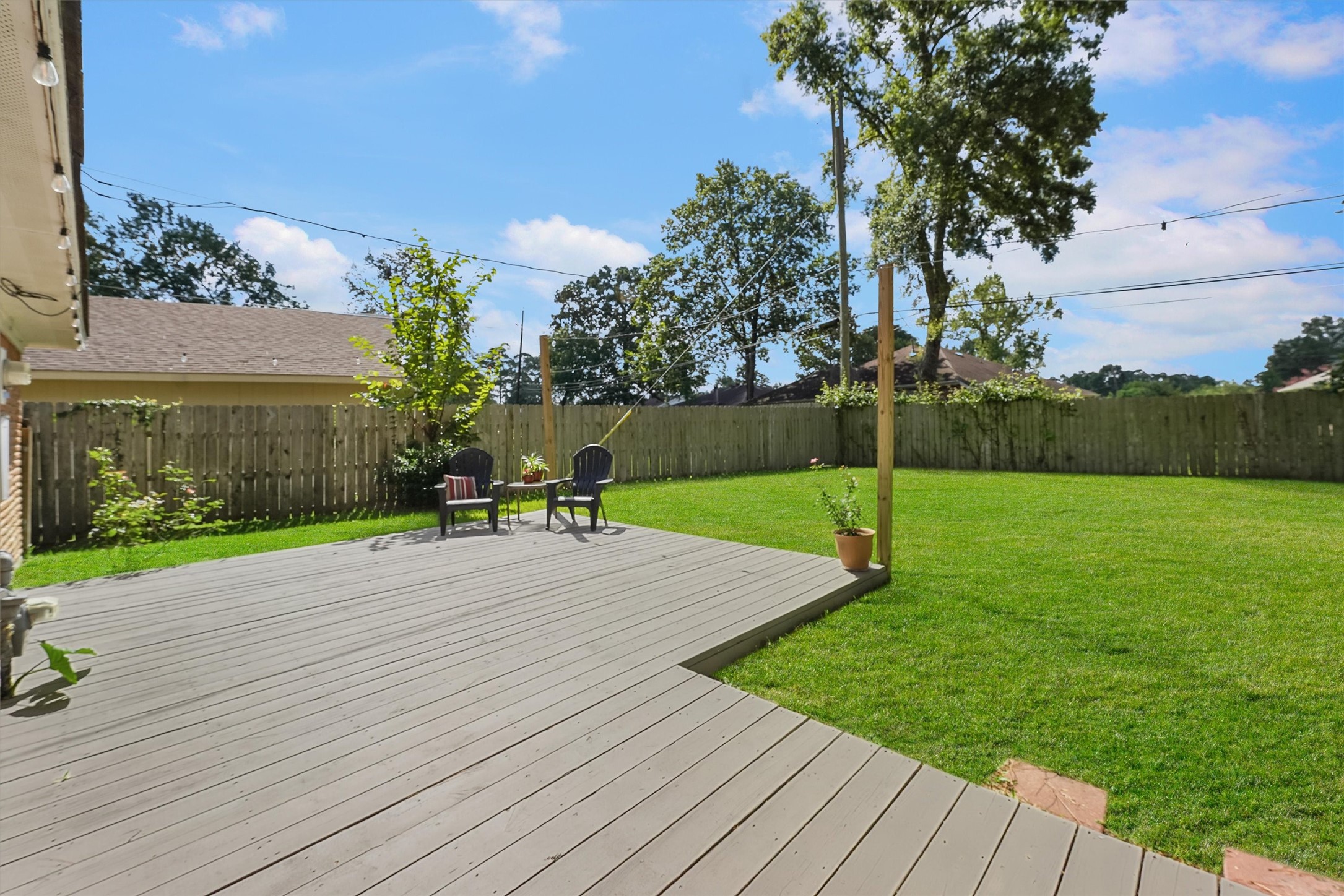 326 Broad Ripple Drive Houston, TX 77336 - Photo 24 of 26 a view of a garden and basketball court