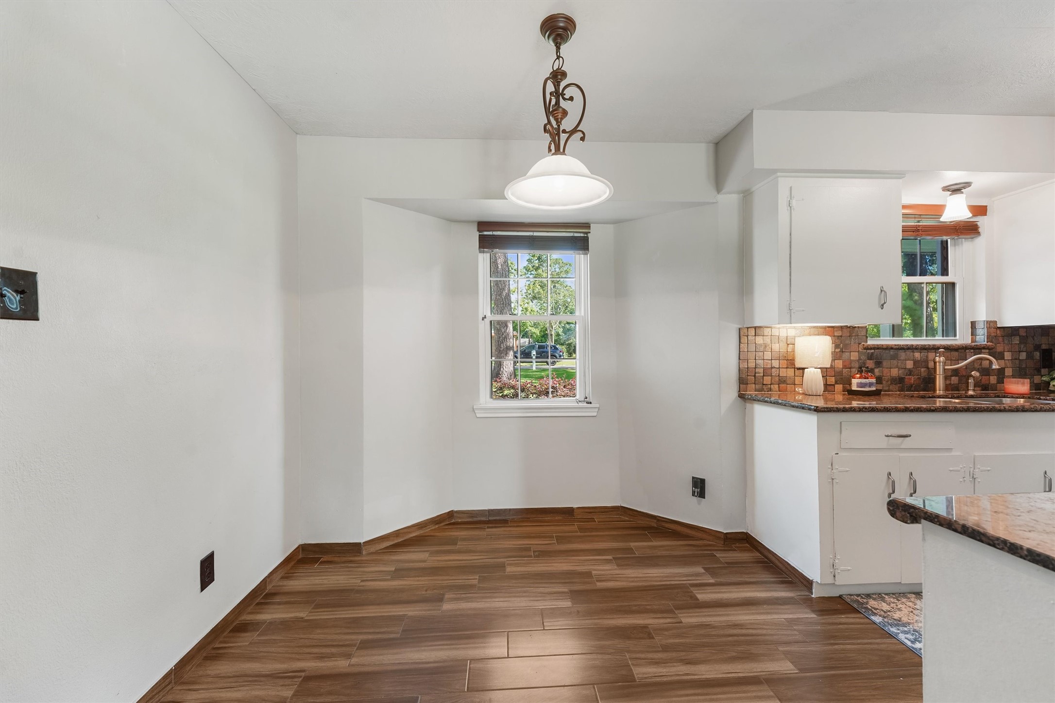 326 Broad Ripple Drive Houston, TX 77336 - Photo 7 of 26 a view of a room with wooden floor and staircase