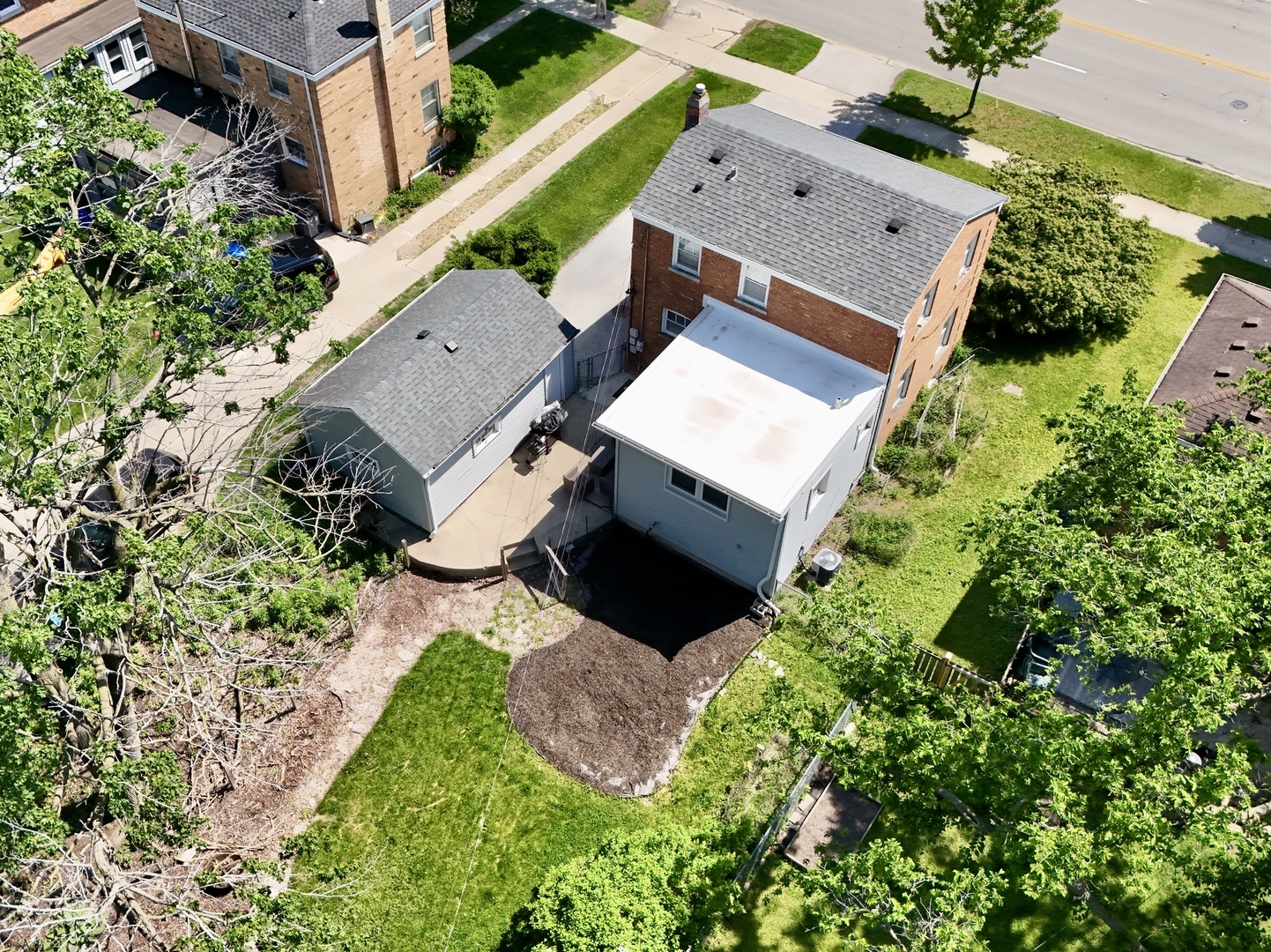 416 North Main Street Mount Prospect, IL 60056 - Photo 20 of 24 an aerial view of a house with a yard