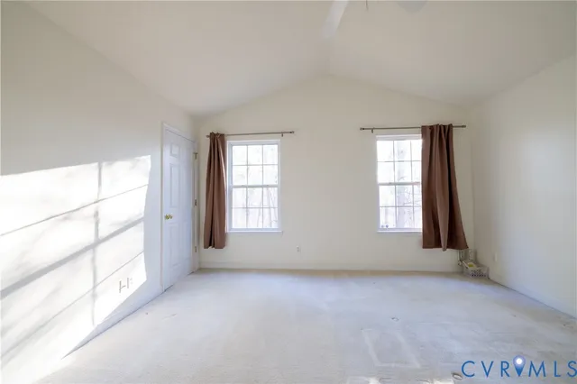 an empty room with windows