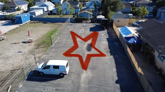 an aerial view of a house with swimming pool