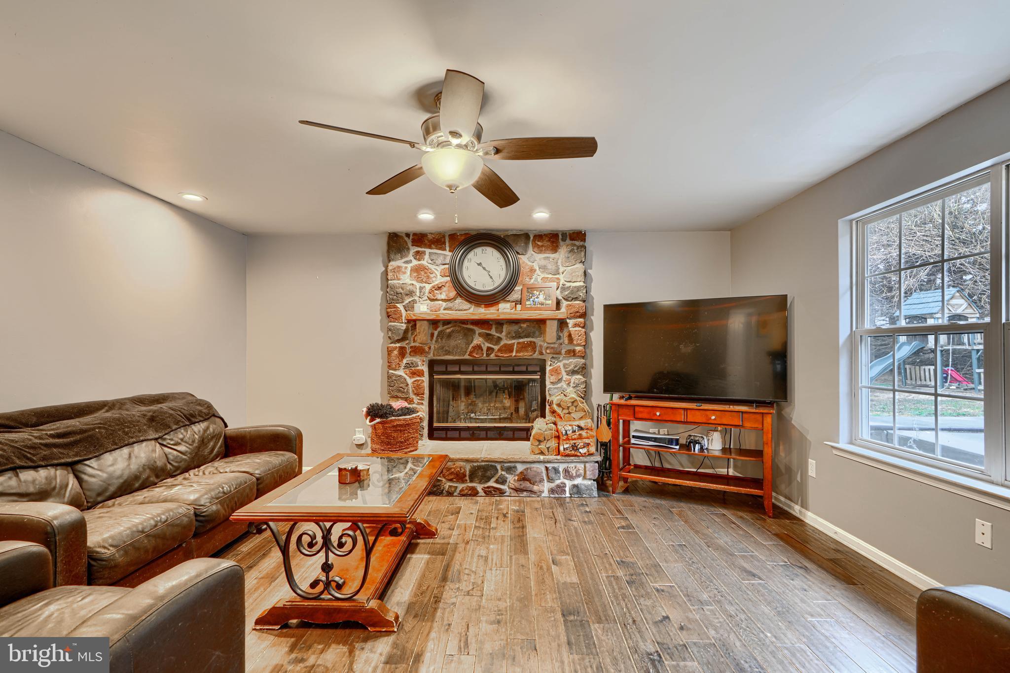 24 Ches Haven Road Earleville, MD 21919 - Photo 27 of 73 a living room with furniture and a flat screen tv