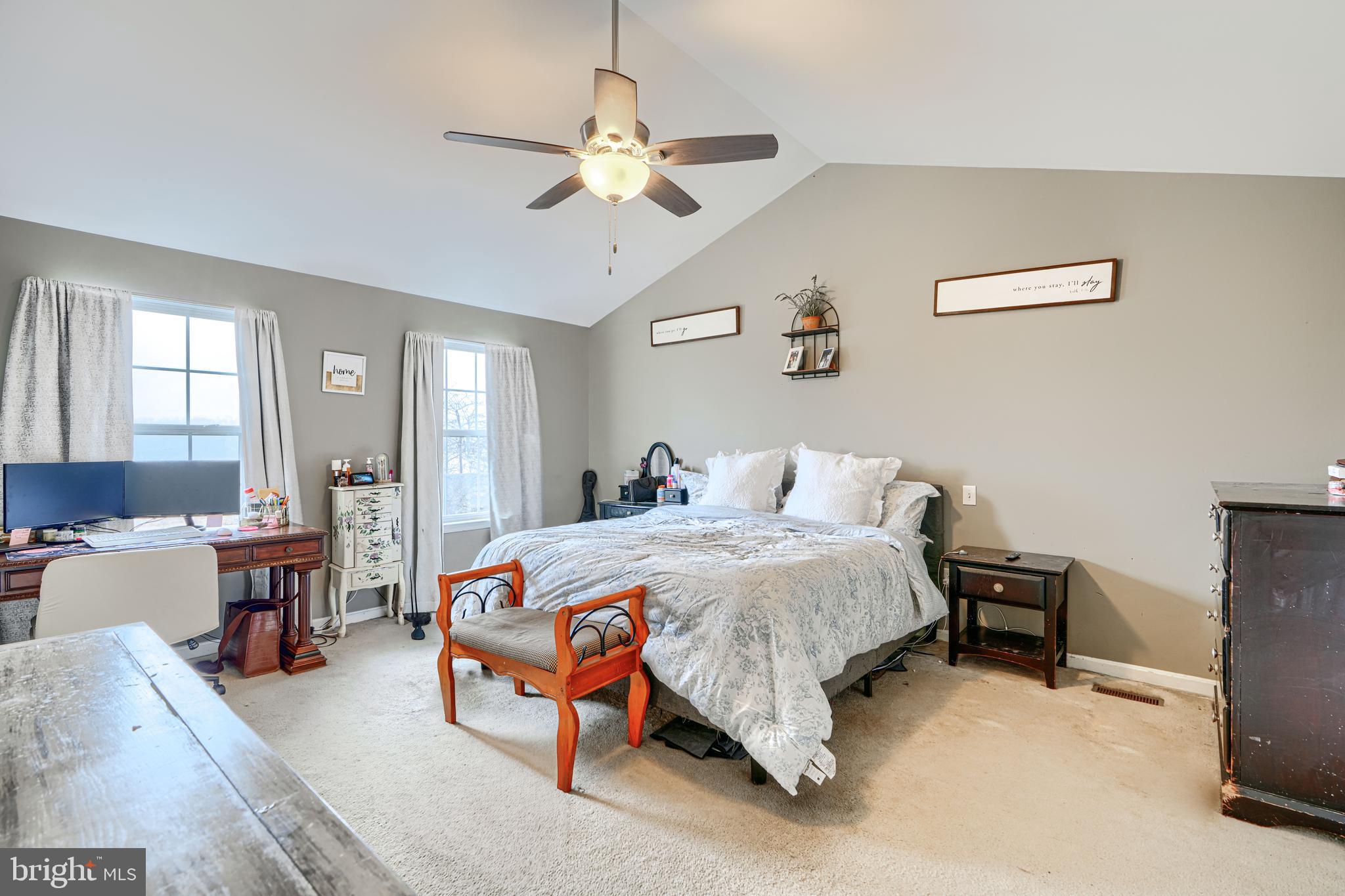 24 Ches Haven Road Earleville, MD 21919 - Photo 30 of 73 a bedroom with a bed and a chandelier