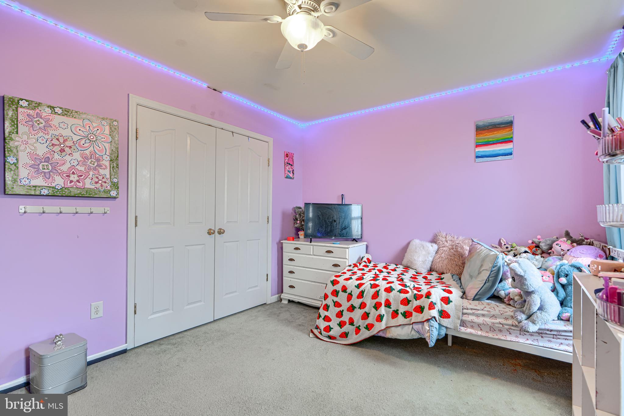 24 Ches Haven Road Earleville, MD 21919 - Photo 43 of 73 a bedroom with a bed and a chandelier