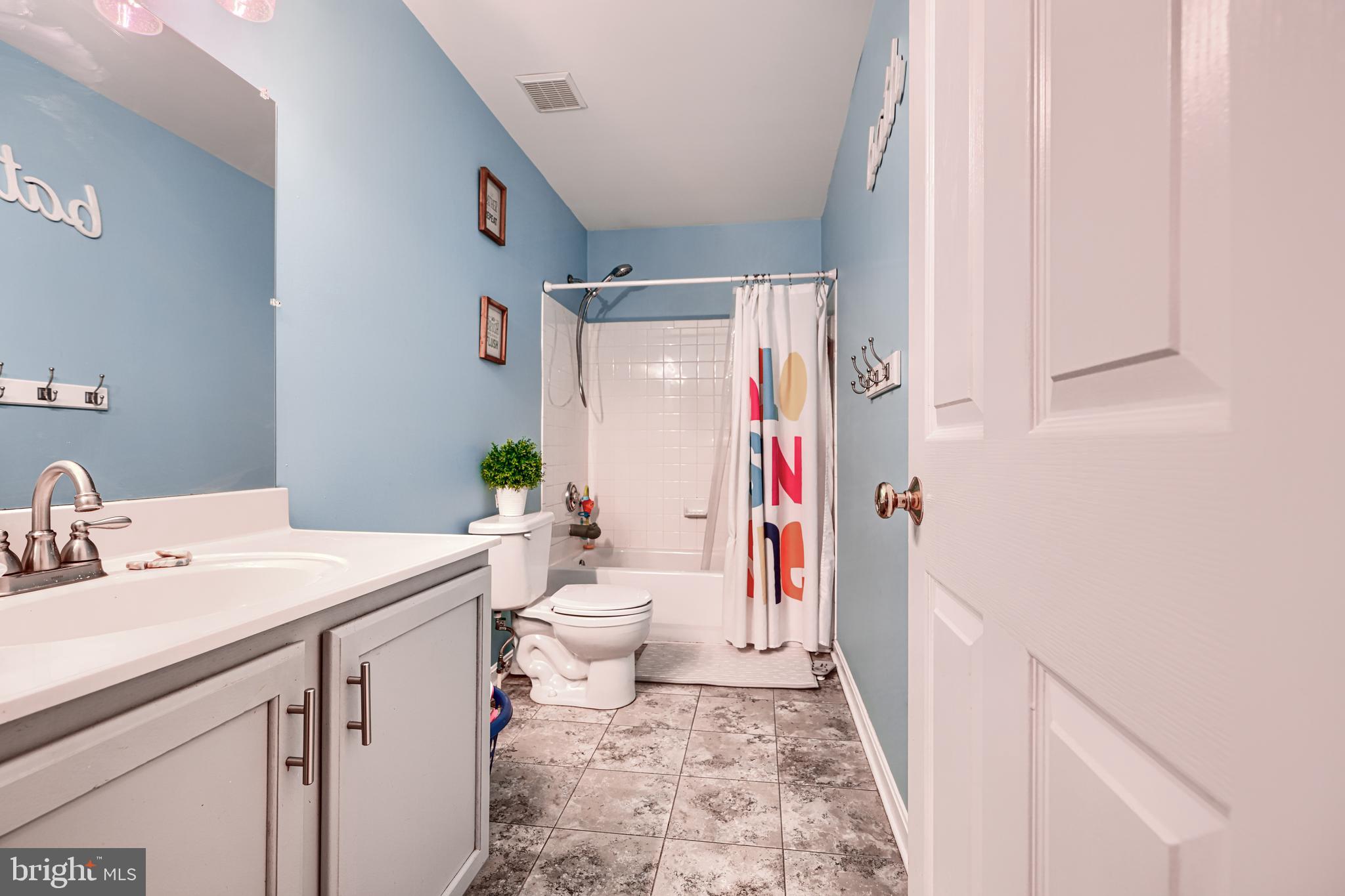 24 Ches Haven Road Earleville, MD 21919 - Photo 49 of 73 a bathroom with a sink toilet and shower