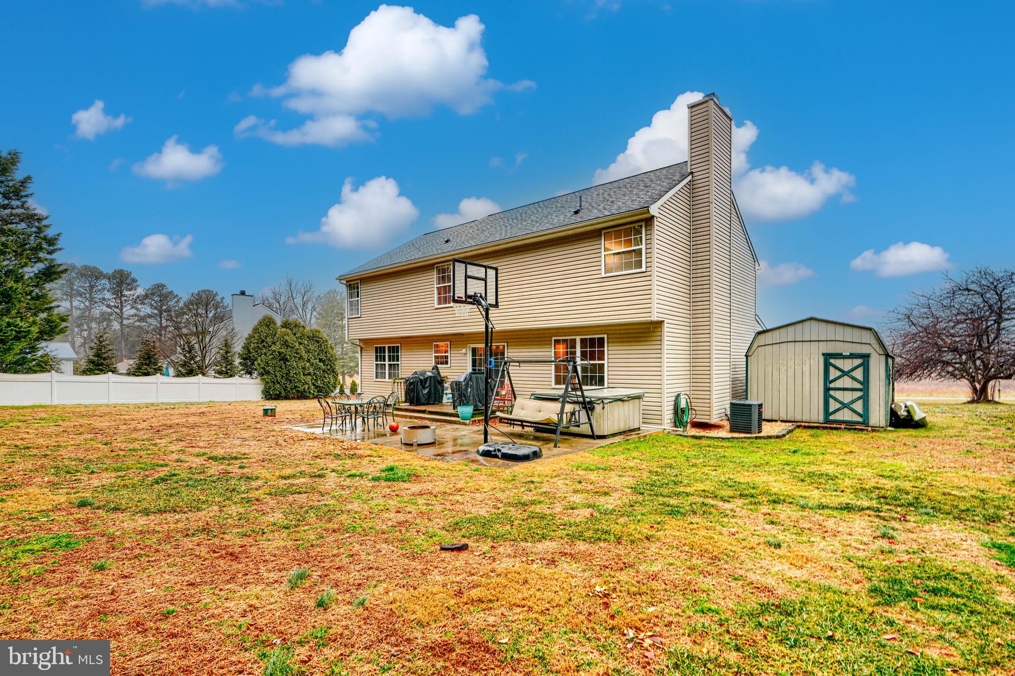 24 Ches Haven Road Earleville, MD 21919 - Photo 57 of 73 a view of a swimming pool with a patio and a yard