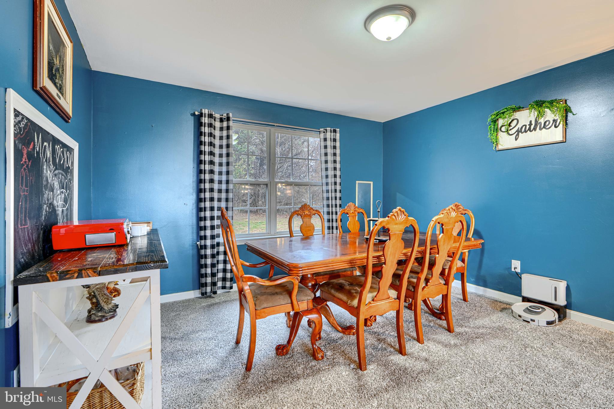 24 Ches Haven Road Earleville, MD 21919 - Photo 9 of 73 a view of a dining room with furniture and chandelier