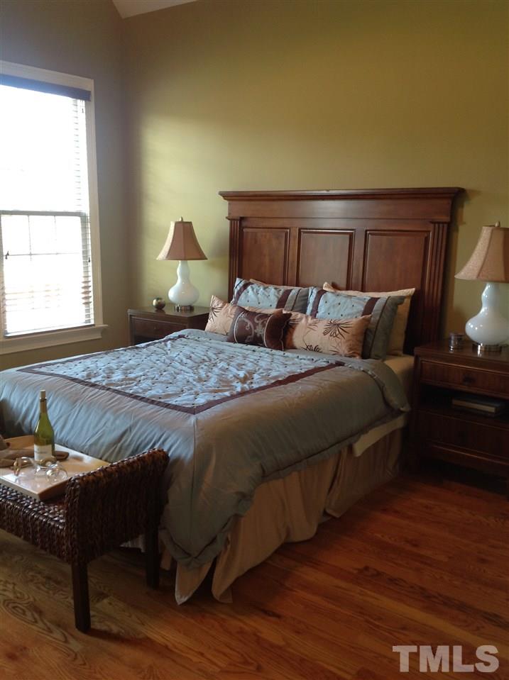305 Woodlief Farm Road Rolesville, NC 27571 - Photo 14 of 25 Awesome master bedroom with doors leading to covered back porch