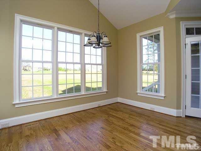 305 Woodlief Farm Road Rolesville, NC 27571 - Photo 7 of 25 Nook leads to covered back porch and fenced back yard