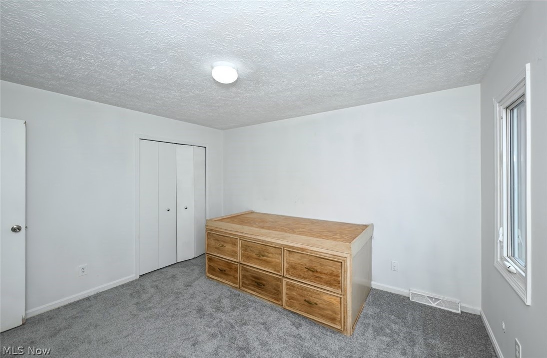6151 Taylor Road Clinton, OH 44216 - Photo 35 of 49 *BDRM #2 W/NEW GREY CARPET, BUILT IN DEEP DRAWERS & SHELVING PLUS CLOSET ~