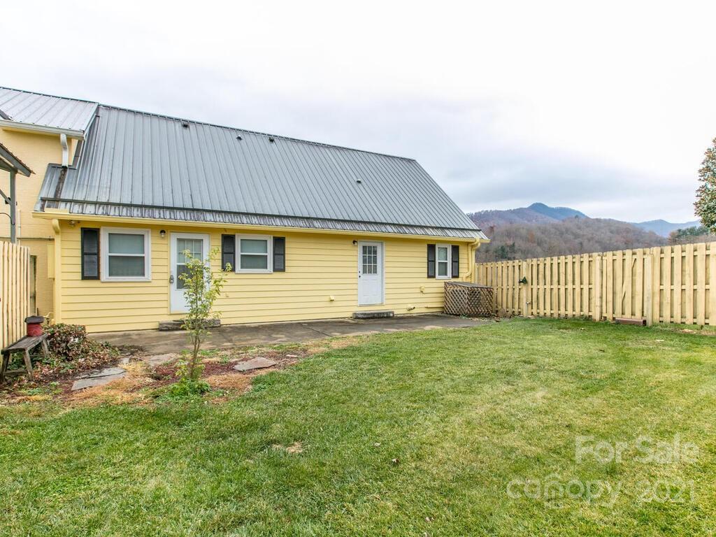 20 Brooks Branch Road Leicester, NC 28748 - Photo 11 of 40 a view of a house with a backyard