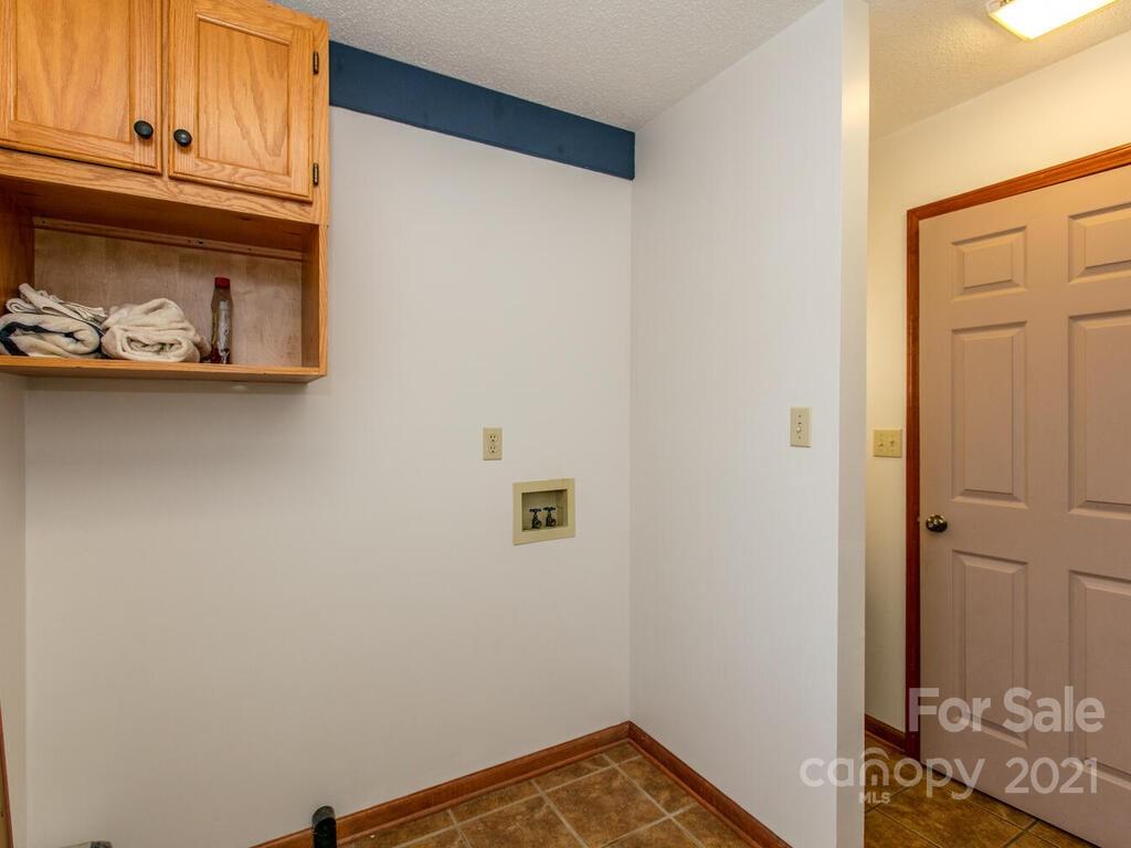 20 Brooks Branch Road Leicester, NC 28748 - Photo 24 of 40 a view of a storage and utility room with closet