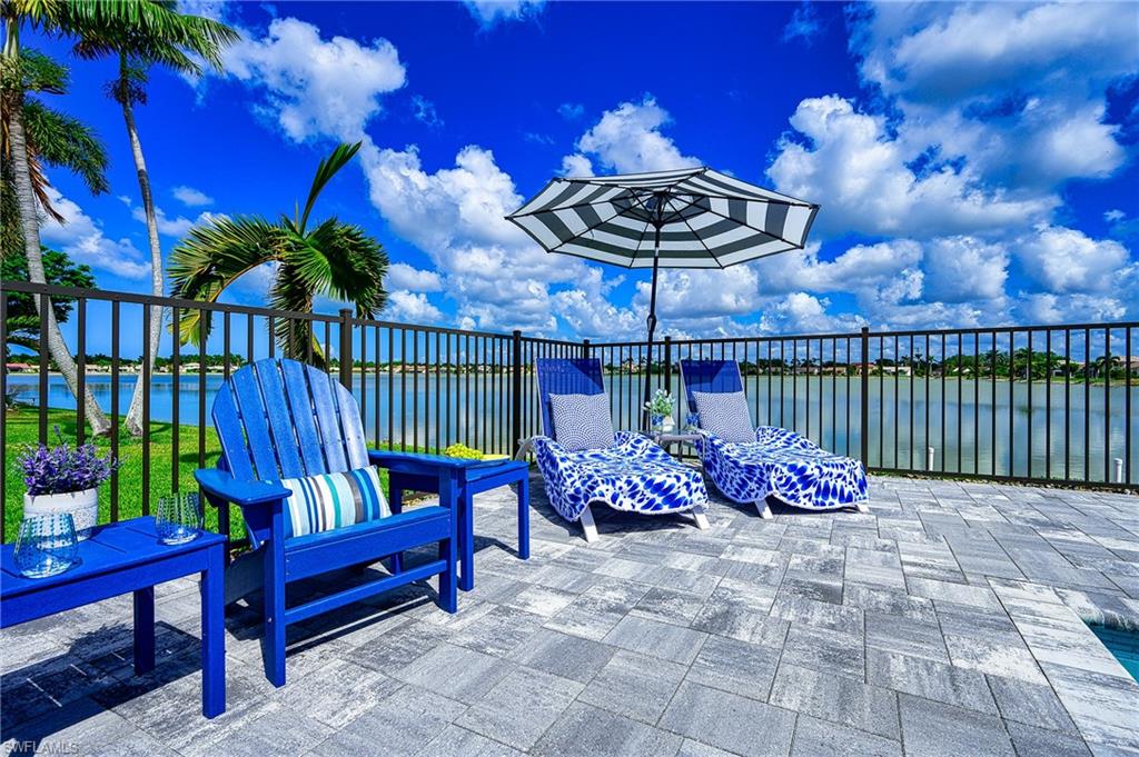 7311 Mill Pond Circle Naples, FL 34109 - Photo 11 of 42 a view of a chairs in a patio