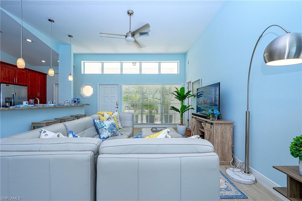 7311 Mill Pond Circle Naples, FL 34109 - Photo 13 of 42 a room with storage and utility