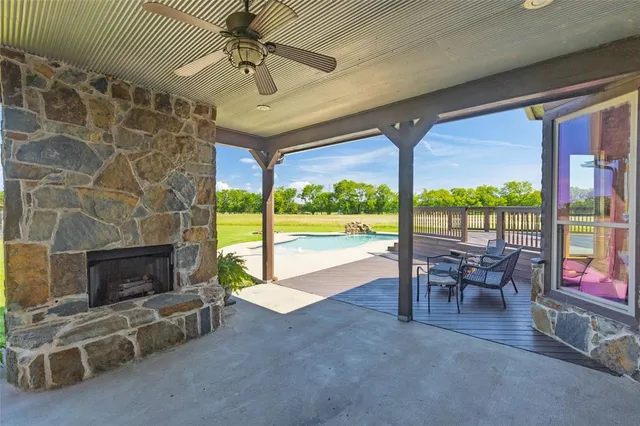 a view of a swimming pool and an outdoor space