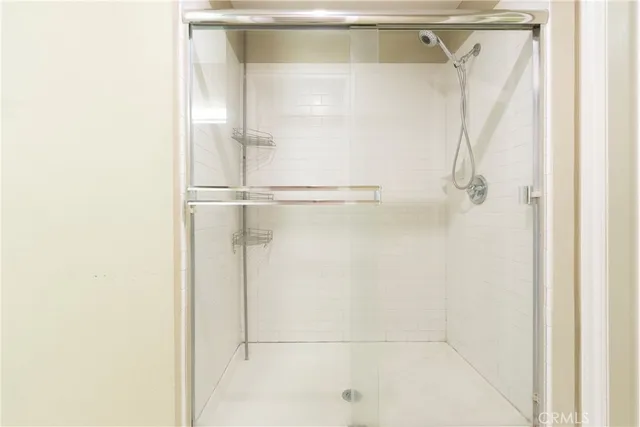 a bathroom with a sink a mirror and a bathtub