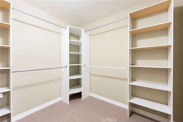 a room with gym equipment and a large window