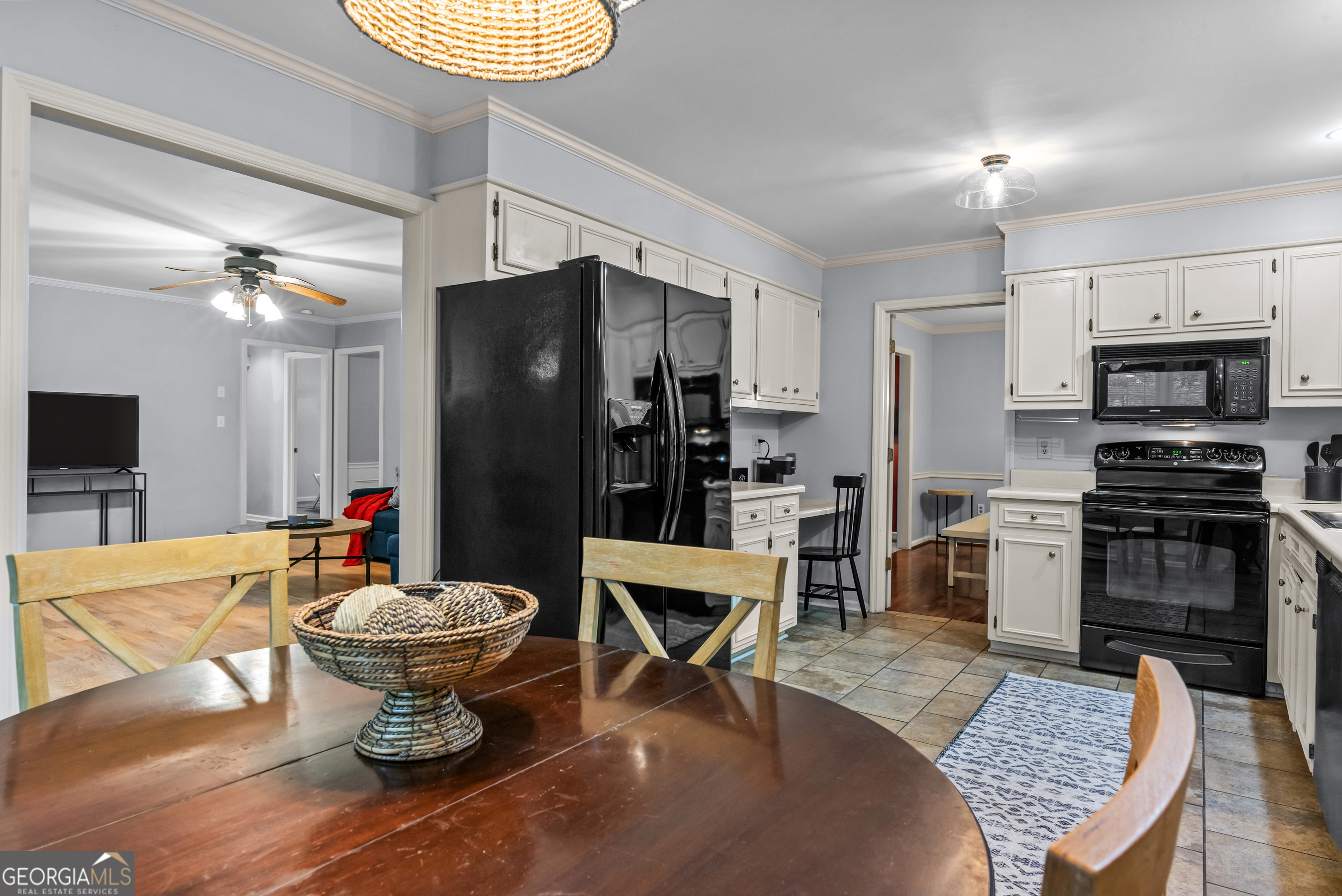 161 Pinecrest Terrace Athens, GA 30606 - Photo 13 of 59 a kitchen with stainless steel appliances a dining table and chairs