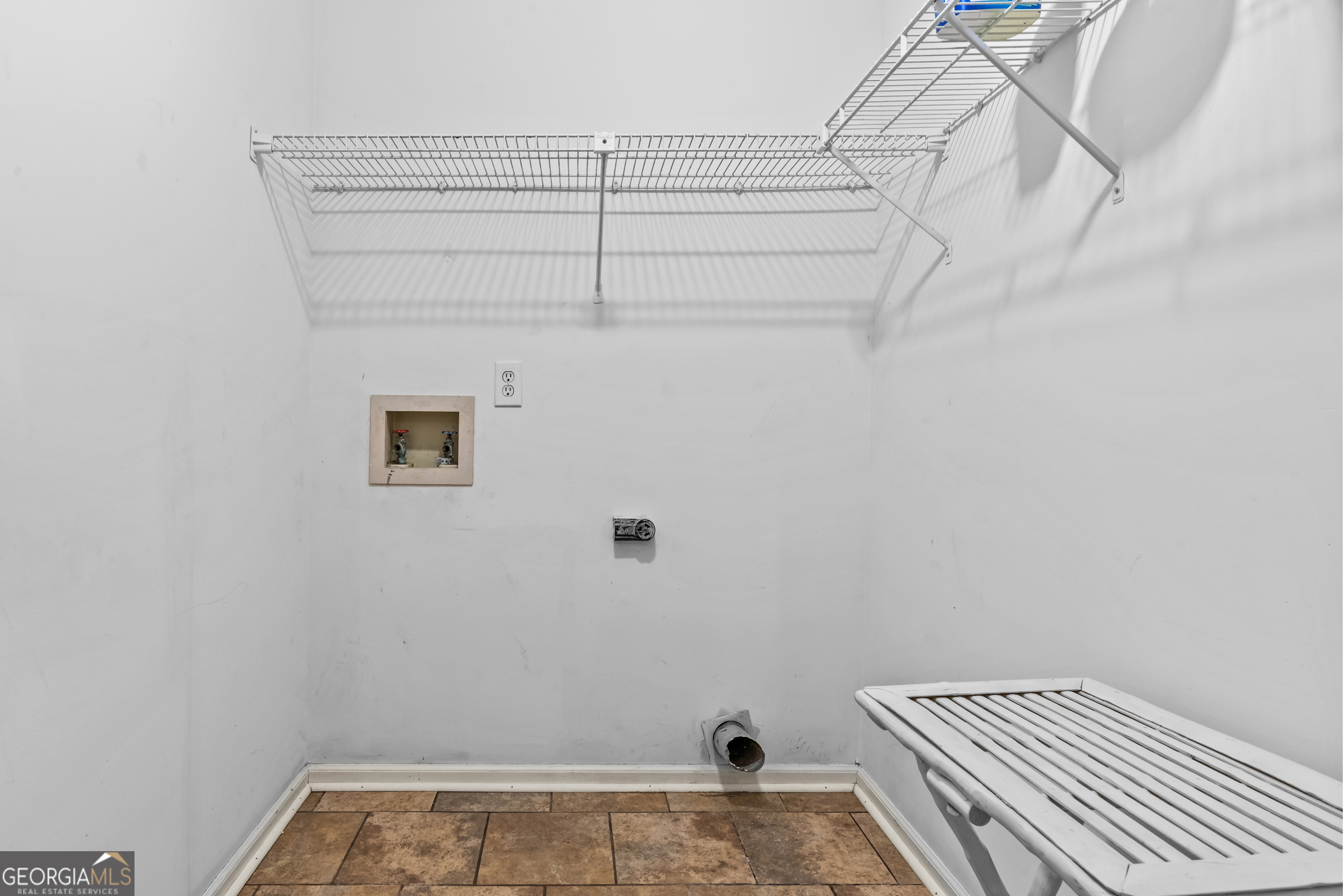 161 Pinecrest Terrace Athens, GA 30606 - Photo 16 of 59 a view of a room with racks on the wall