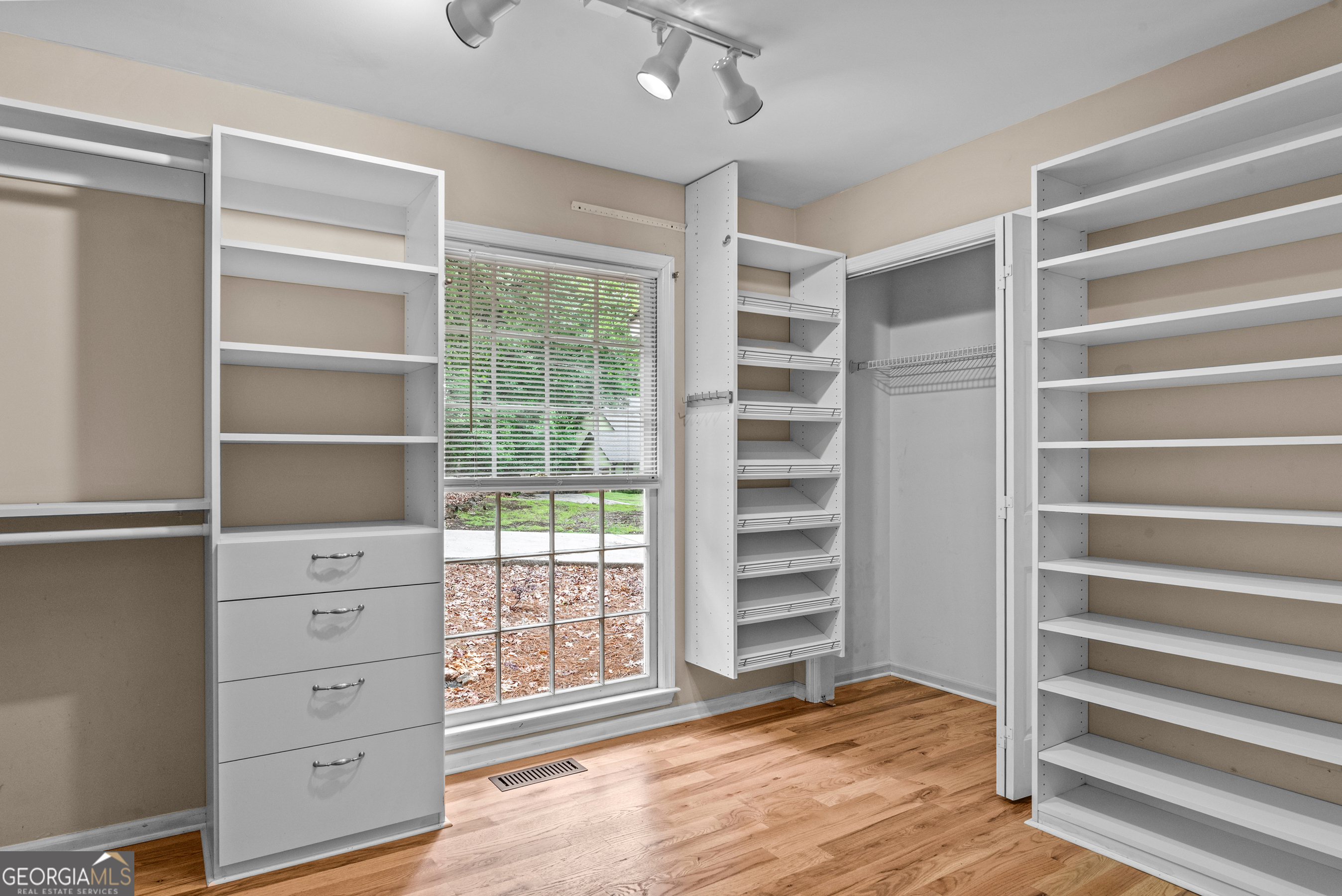 161 Pinecrest Terrace Athens, GA 30606 - Photo 28 of 59 a view of walk in closet with empty racks