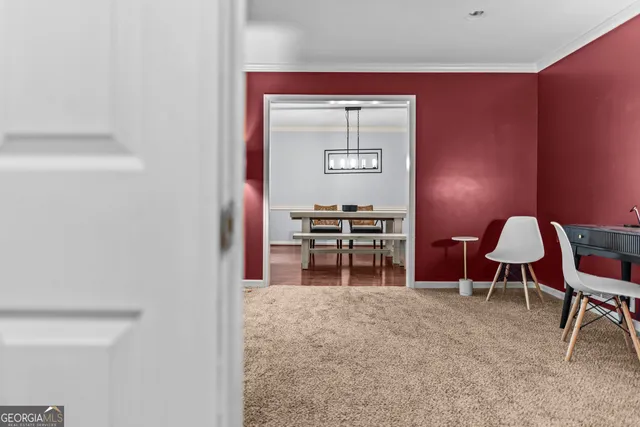 a room with furniture and gym equipment