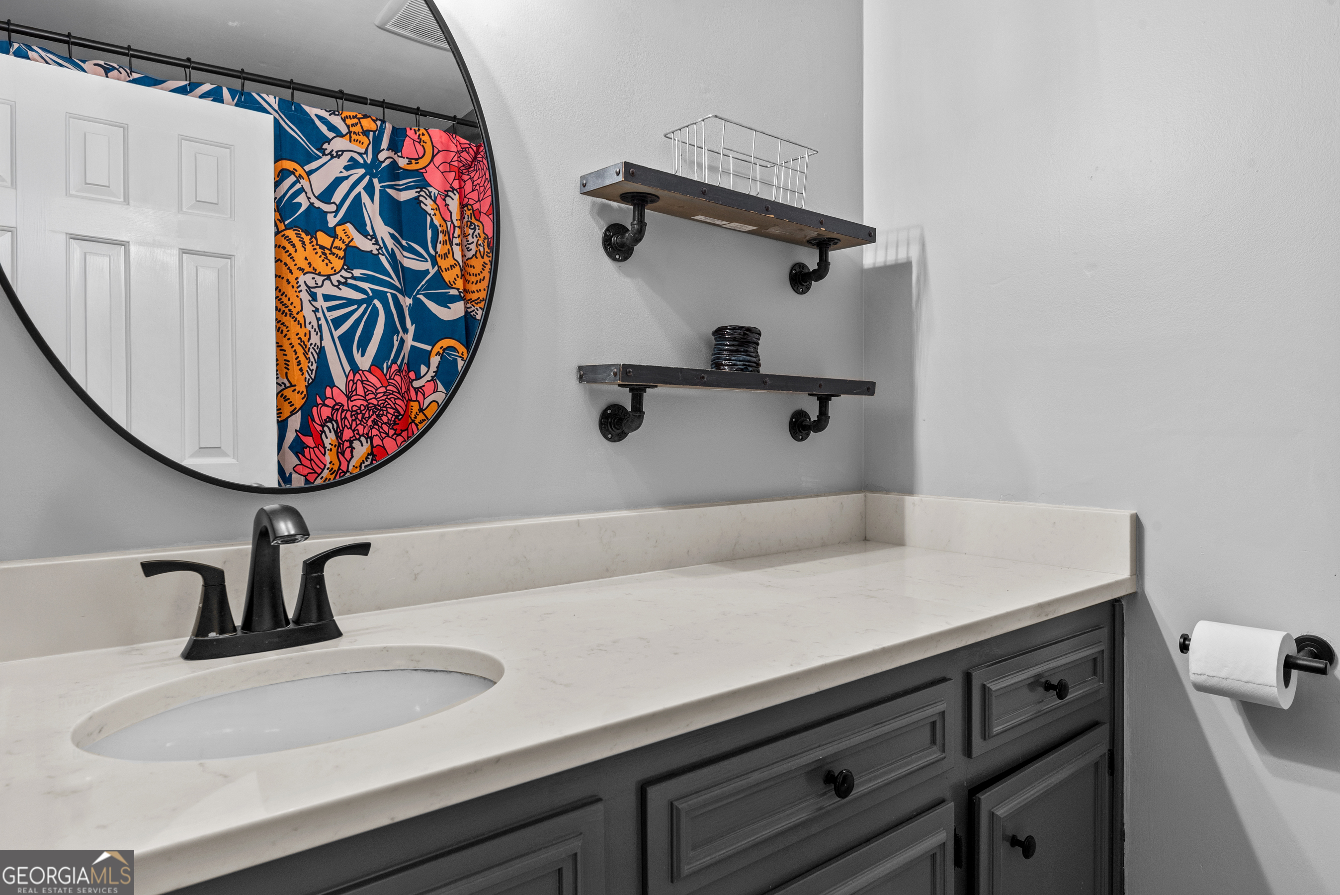 161 Pinecrest Terrace Athens, GA 30606 - Photo 36 of 59 a bathroom with a sink and a mirror