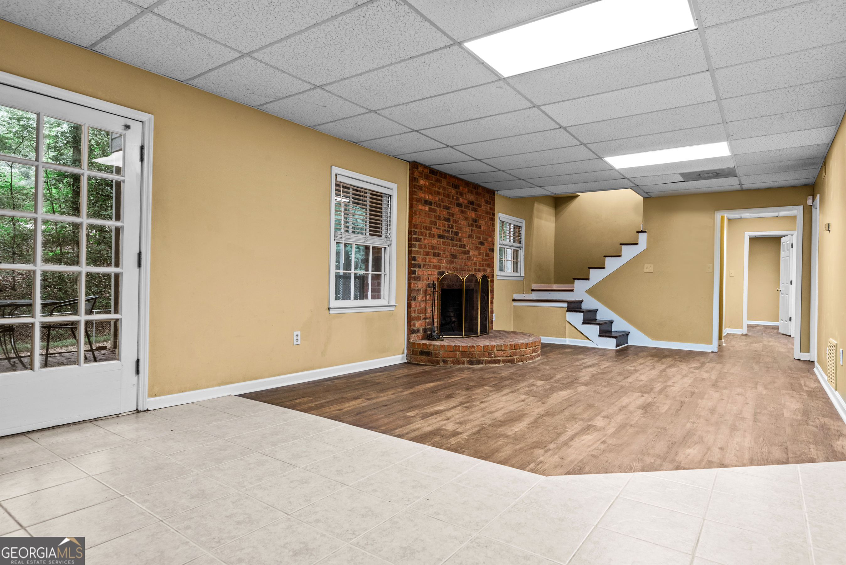 161 Pinecrest Terrace Athens, GA 30606 - Photo 40 of 59 a view of a livingroom with a fireplace and a large window