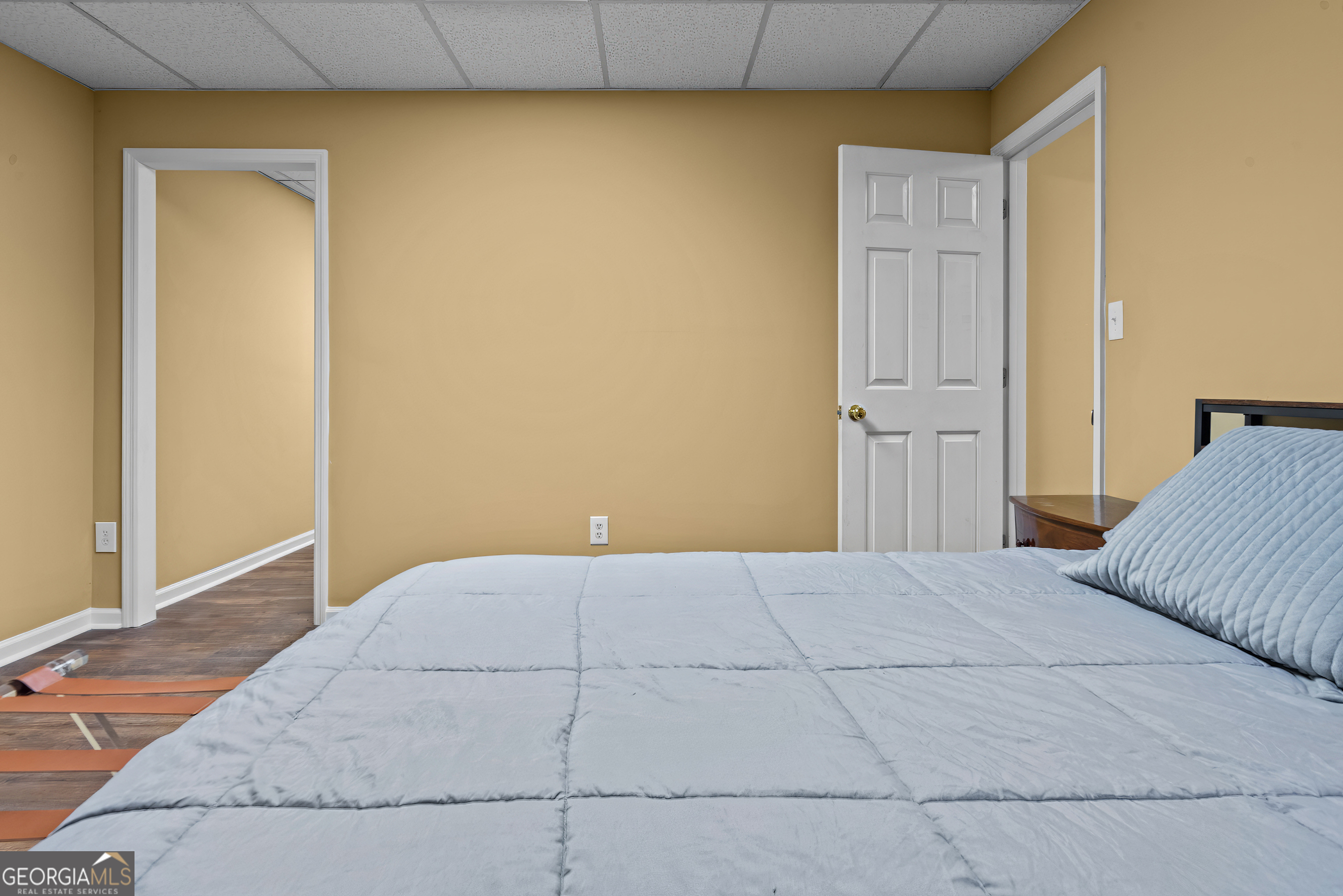 161 Pinecrest Terrace Athens, GA 30606 - Photo 43 of 59 a bedroom with a bed and a painting on the wall