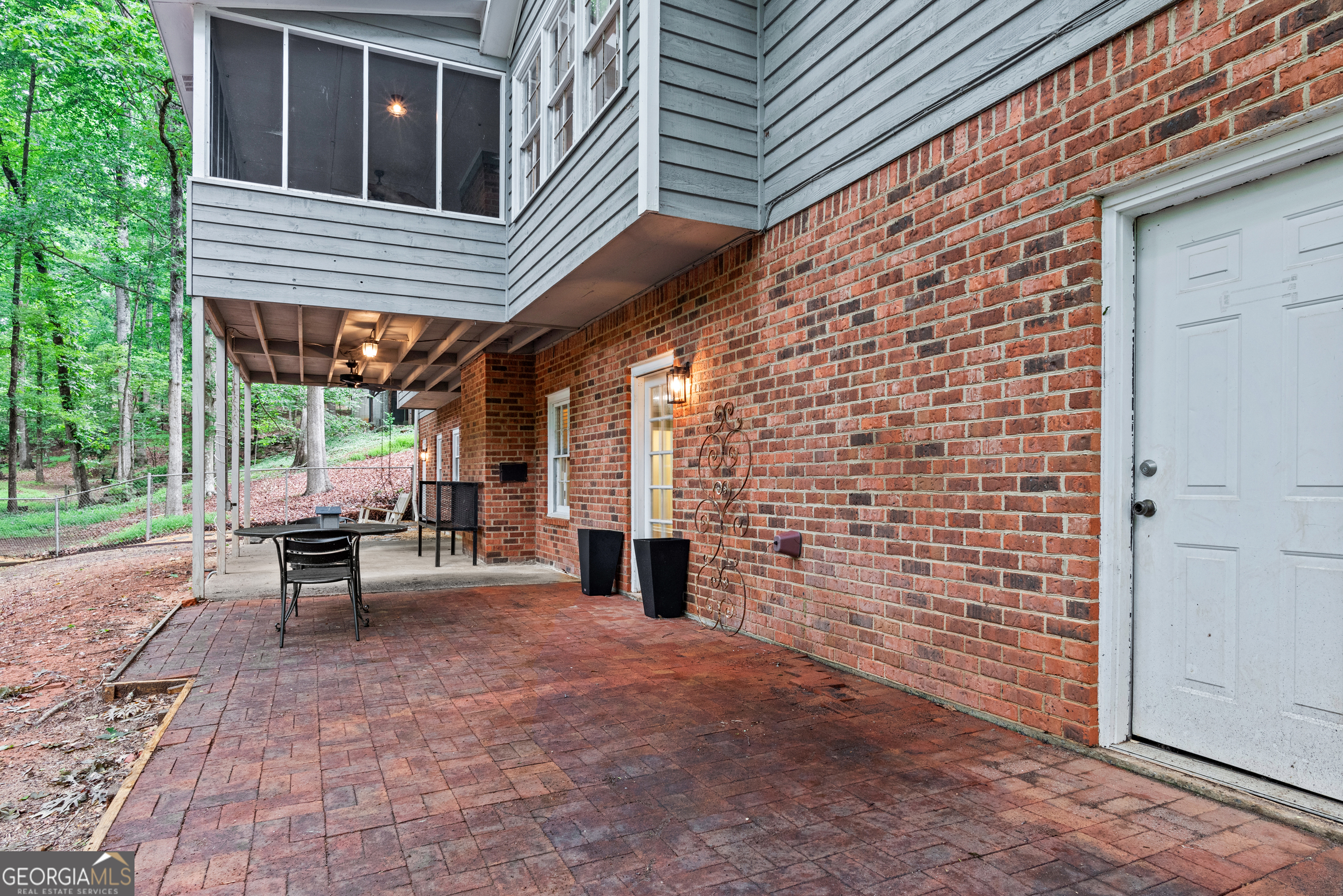 161 Pinecrest Terrace Athens, GA 30606 - Photo 48 of 59 a view of a patio with table and chairs and potted plants