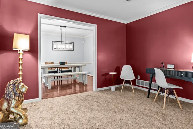 a view of a dining room with furniture large window and wooden floor