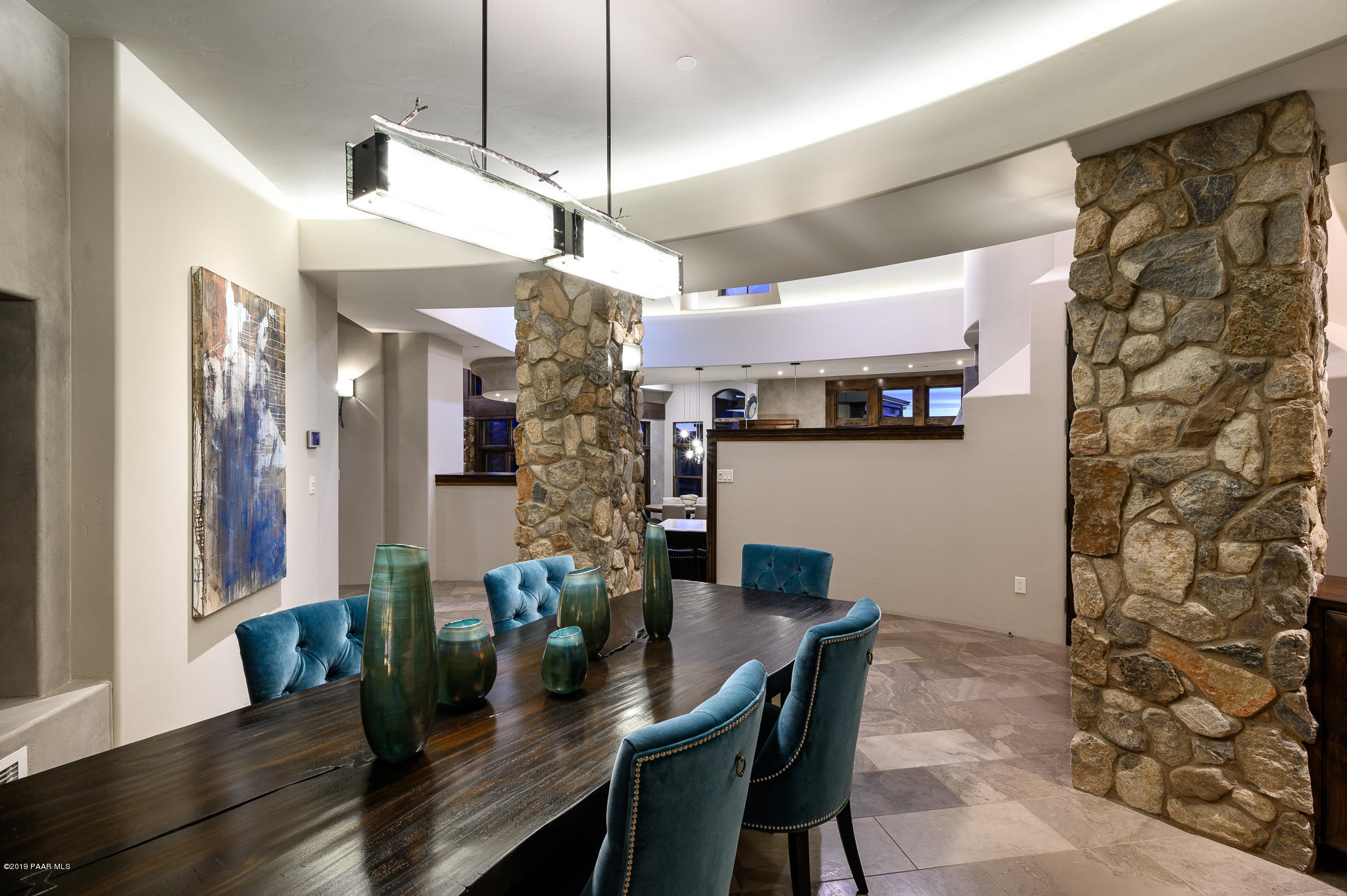 6785 West Almosta Ranch Road Prescott, AZ 86305 - Photo 25 of 81 a view of a dining room with furniture and wooden floor