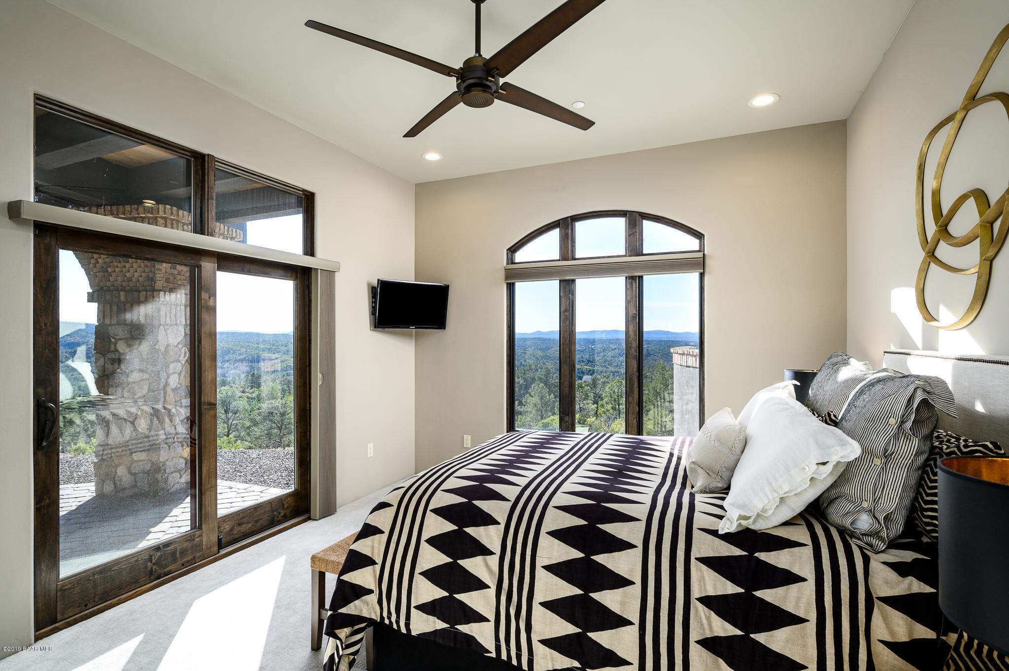 6785 West Almosta Ranch Road Prescott, AZ 86305 - Photo 45 of 81 a bedroom with a bed and a balcony