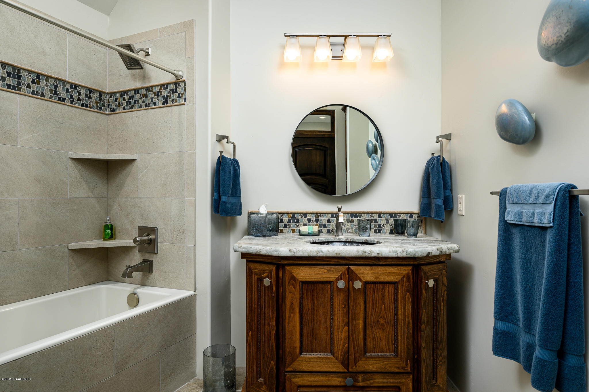 6785 West Almosta Ranch Road Prescott, AZ 86305 - Photo 51 of 81 a bathroom with a sink and a mirror
