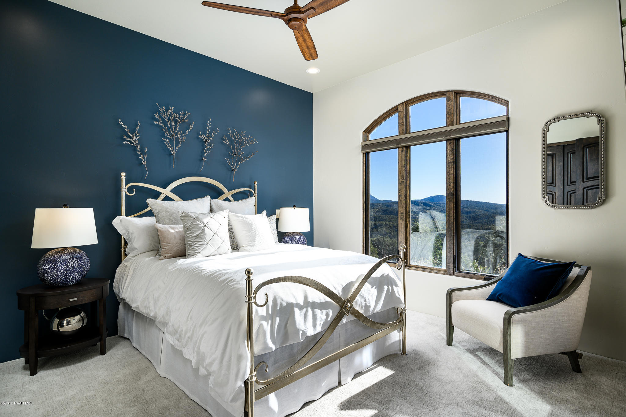 6785 West Almosta Ranch Road Prescott, AZ 86305 - Photo 52 of 81 a bedroom with a bed a couch and dresser