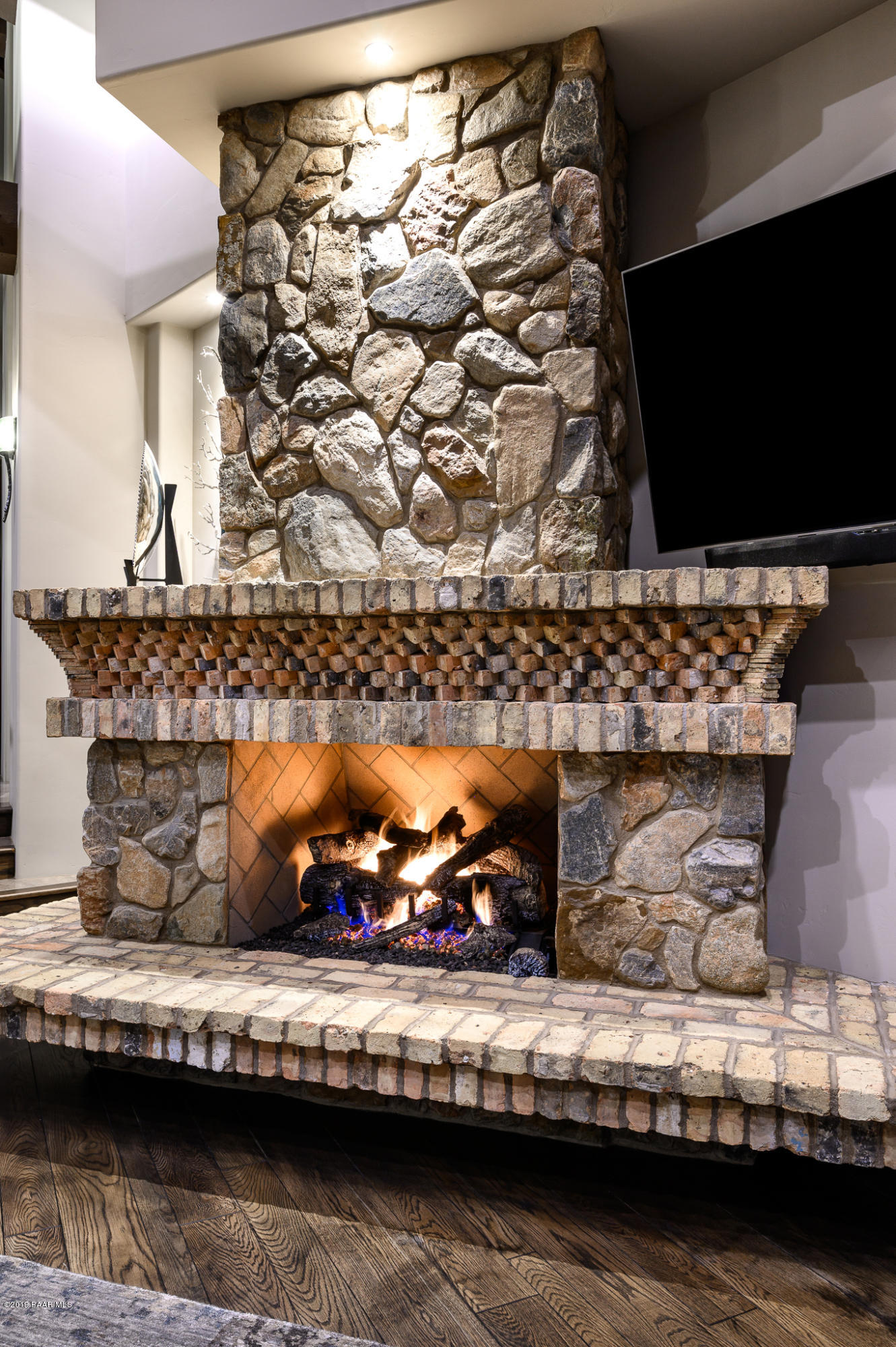 6785 West Almosta Ranch Road Prescott, AZ 86305 - Photo 55 of 81 a living room with lots of furniture and a fireplace