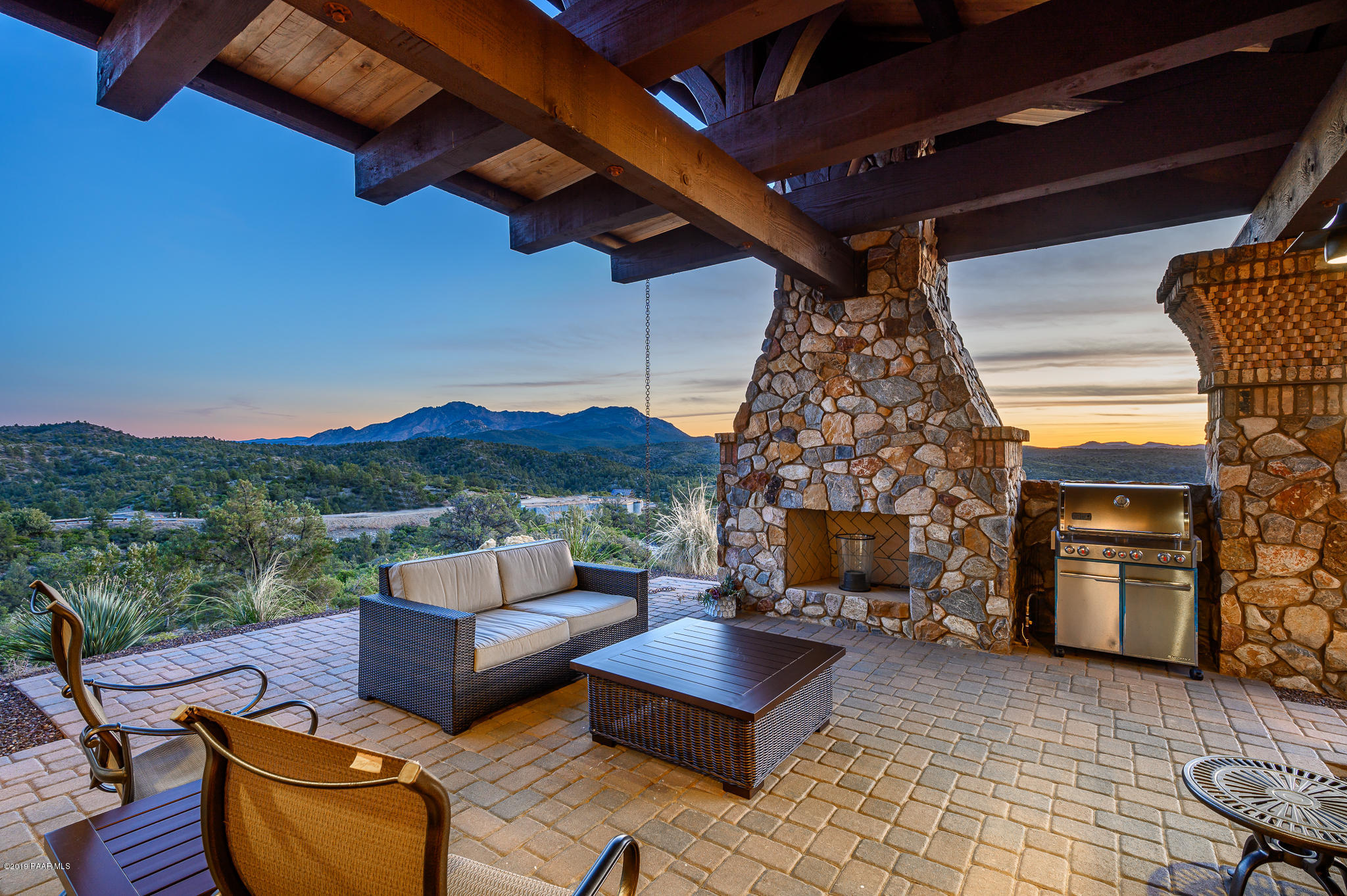 6785 West Almosta Ranch Road Prescott, AZ 86305 - Photo 59 of 81 a outdoor living space with furniture and a fireplace