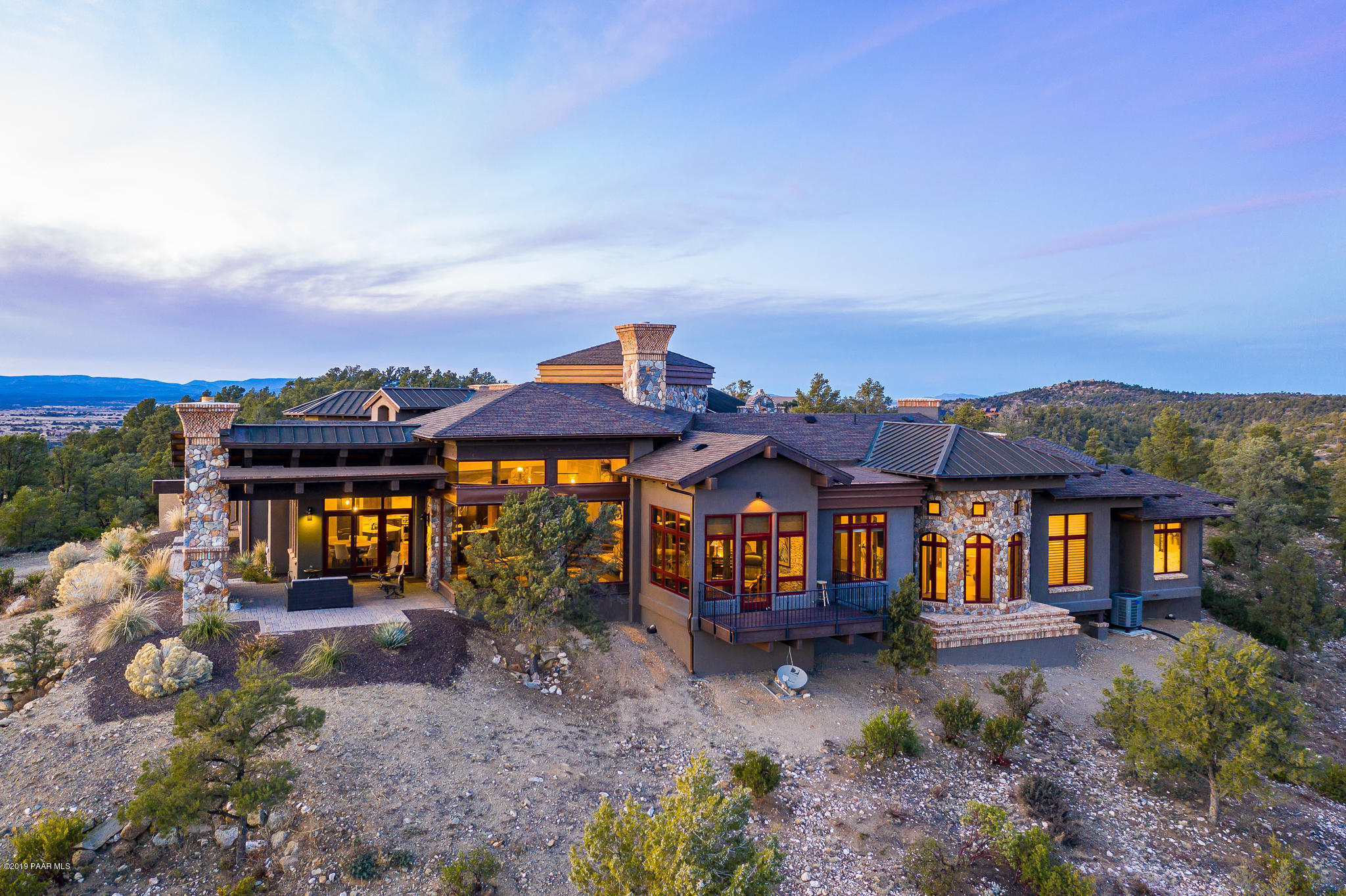6785 West Almosta Ranch Road Prescott, AZ 86305 - Photo 6 of 81 a front view of a house with yard and seating space
