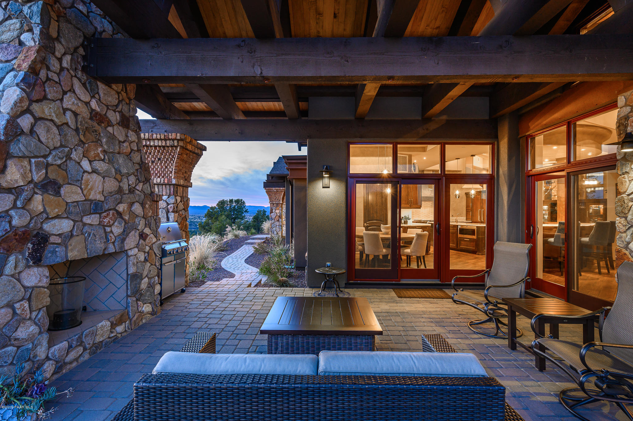 6785 West Almosta Ranch Road Prescott, AZ 86305 - Photo 62 of 81 a living room with furniture and a fireplace