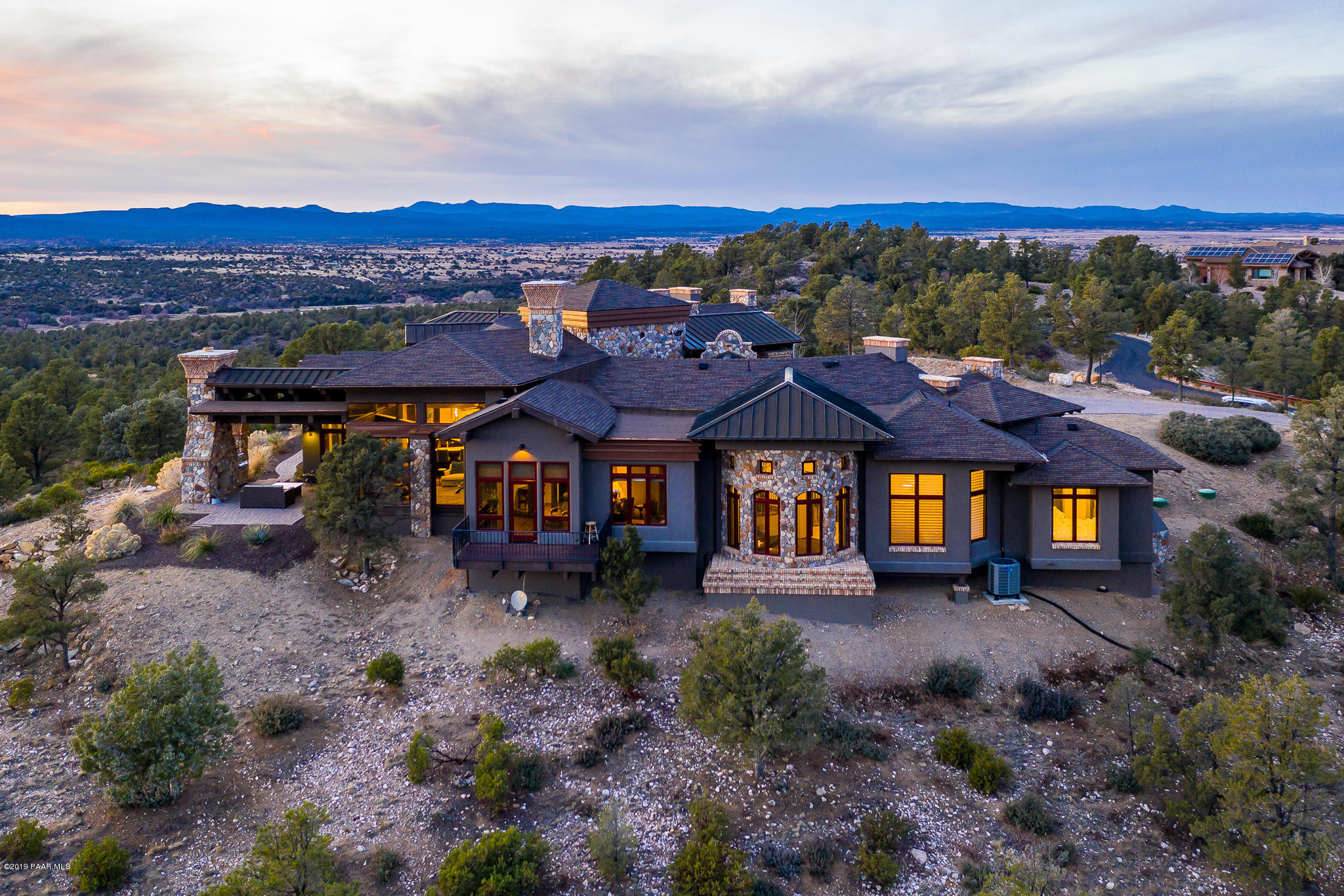 6785 West Almosta Ranch Road Prescott, AZ 86305 - Photo 80 of 81 a view of a big house with a big yard and large tree