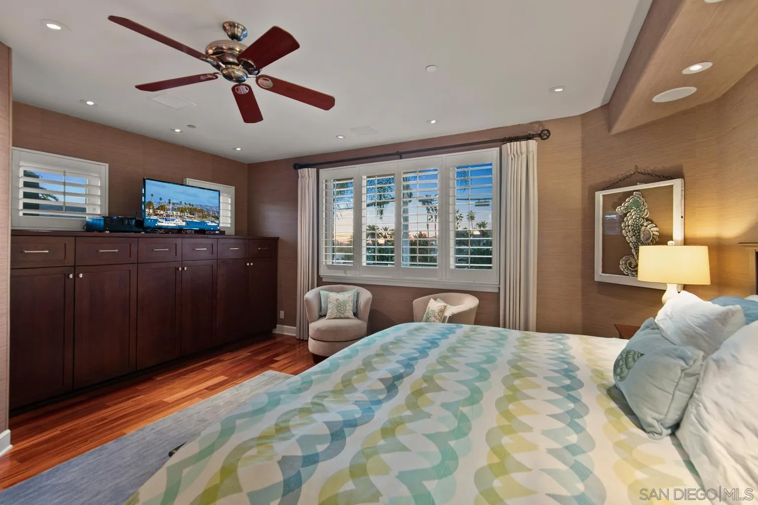 149 3rd Street Encinitas, CA 92024 - Photo 14 of 26 a bedroom with a large bed and a large window