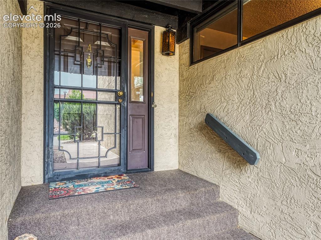 1146 Fontmore Road, Unit A Colorado Springs, CO 80904 - Photo 7 of 24 a view of a door and an outdoor space