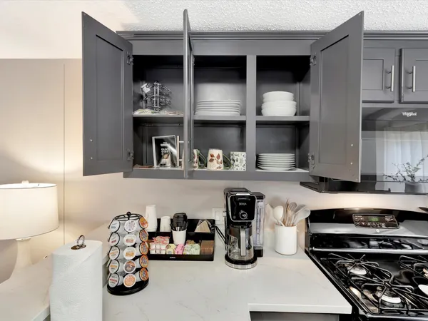 a living room with furniture and rug