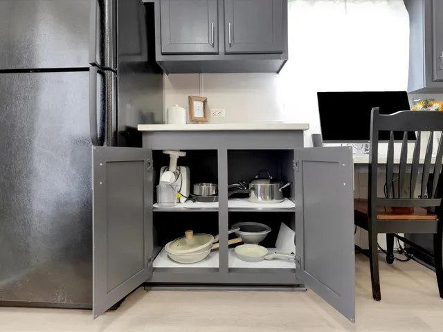 a bathroom with a shower and a sink
