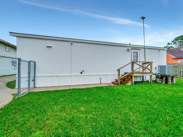 a front view of house with garden