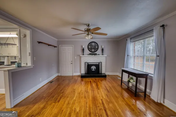 a utility room with cabinets dryer and washer