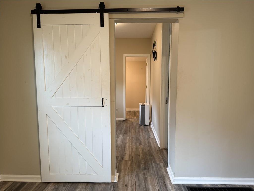 1097 Fortress Avenue Southwest Atlanta, GA 30315 - Photo 26 of 39 a view of a hallway with wooden floor